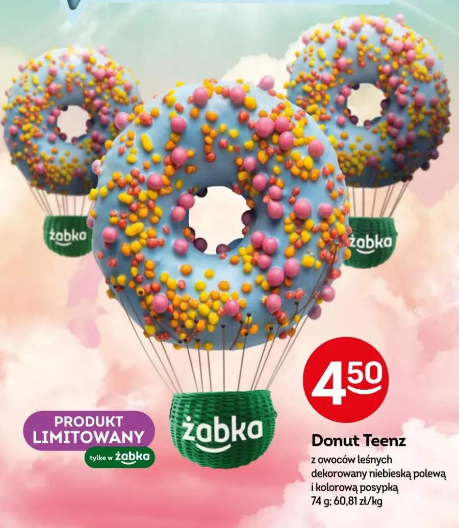 Donut z owoców leśnych dekorowany niebieską polewą i kolorową posypką